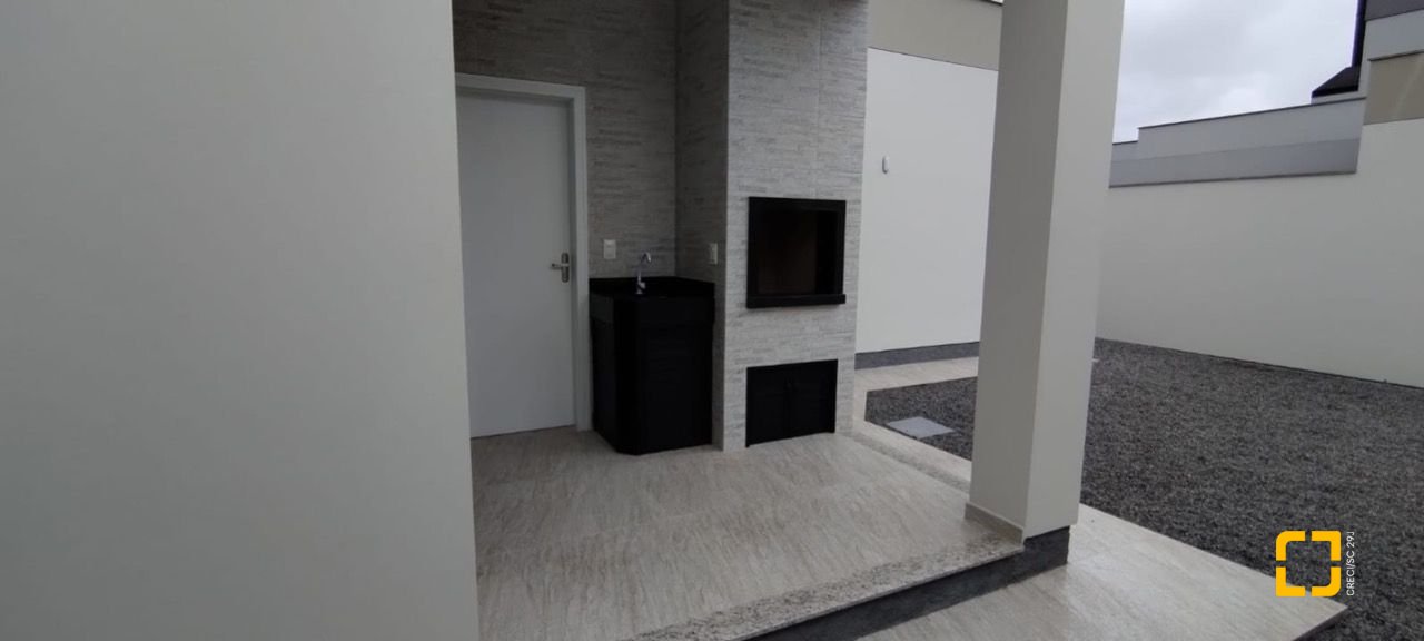 Casa de Condomínio com 137m², 3 quartos (sendo 1 suíte), 2 garagens, no bairro Praia de Fora em Palhoça