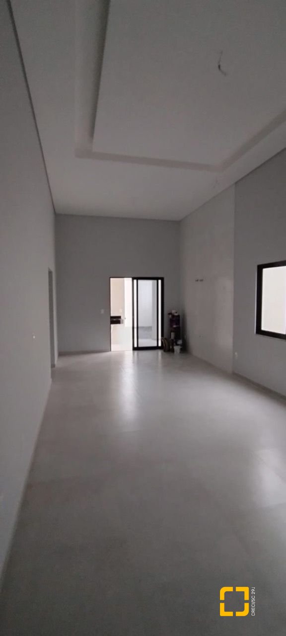 Casa de Condomínio com 137m², 3 quartos (sendo 1 suíte), 2 garagens, no bairro Praia de Fora em Palhoça