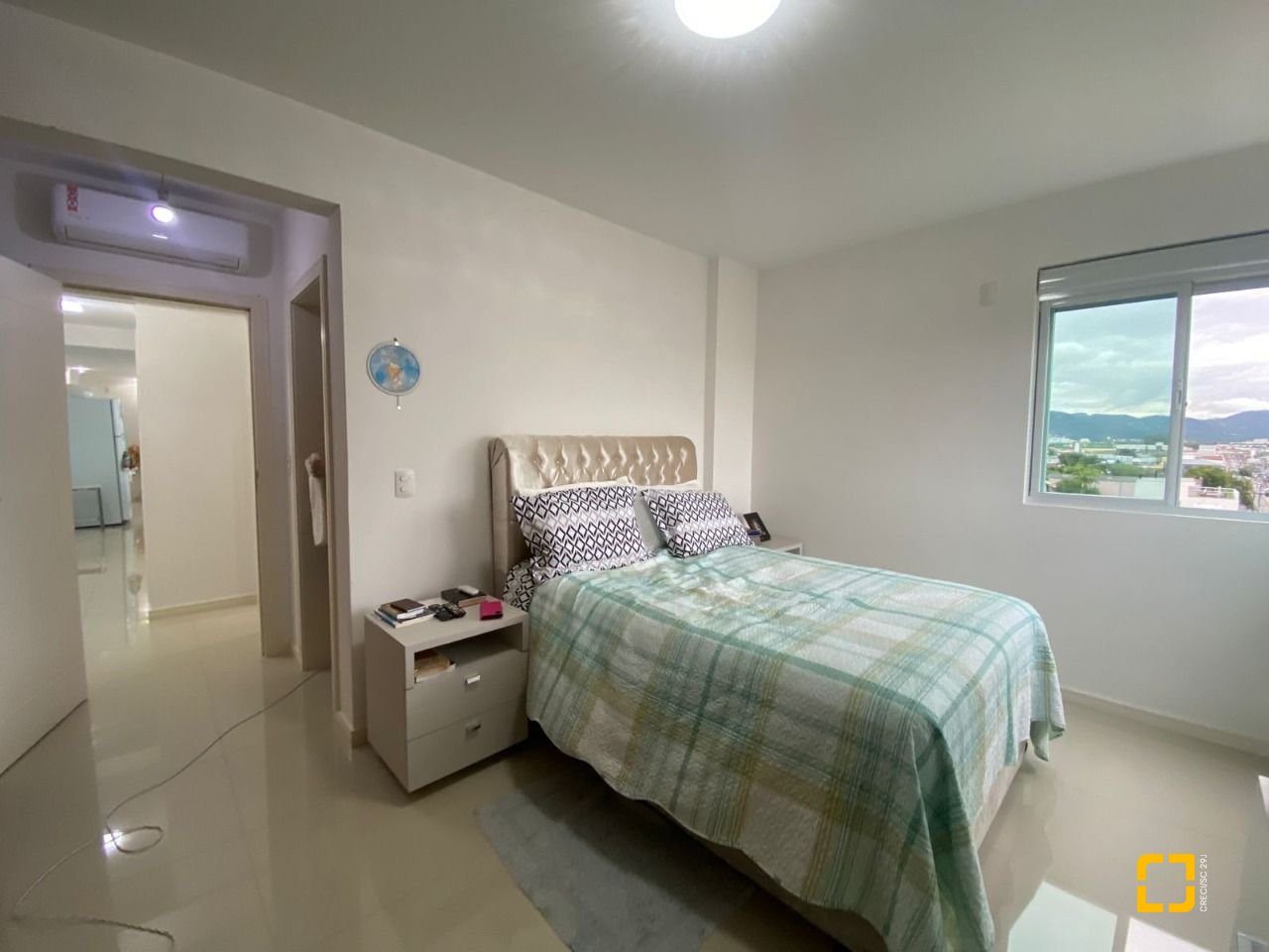 Apartamento com 75m², 2 quartos (sendo 1 suíte), 1 garagem, no bairro Centro em Palhoça