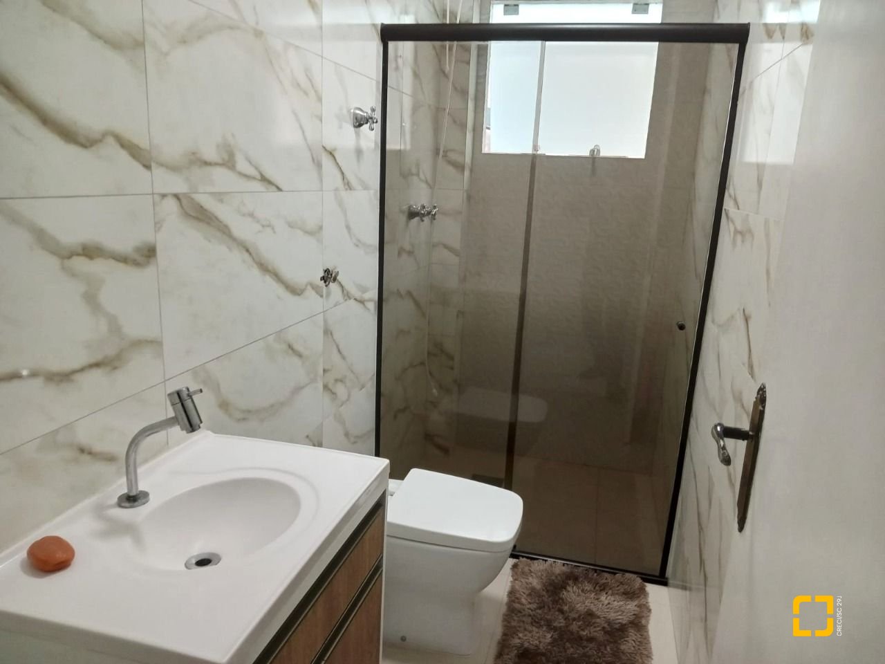 Casa com 147m², 4 quartos (sendo 1 suíte), 4 garagens, no bairro São Sebastião em Palhoça